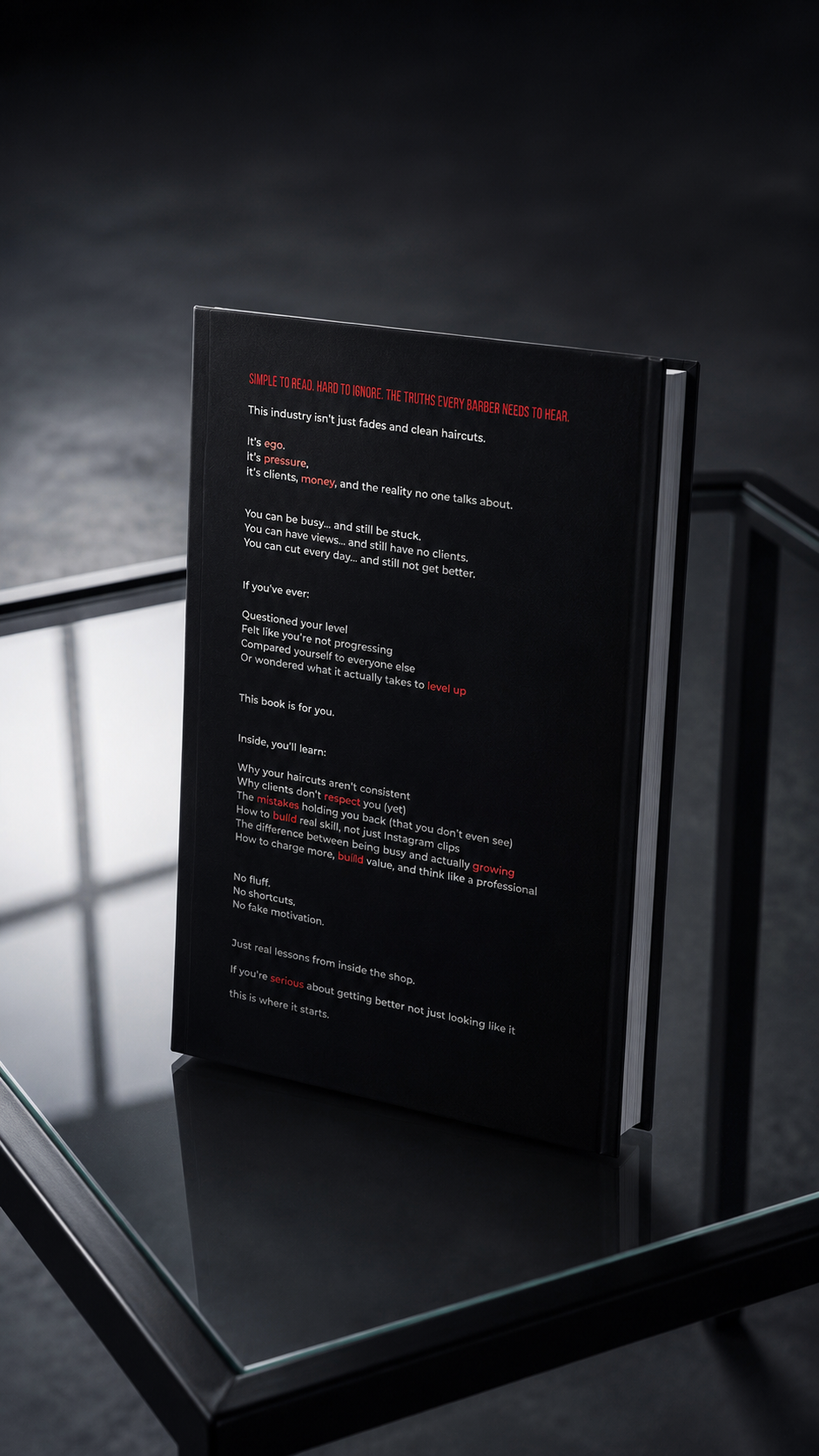 The Cutting Truth back cover by Teegan Dyson — barber mindset book standing upright on dark surface